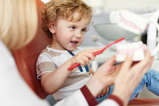 Teaching child to taking care of teeth